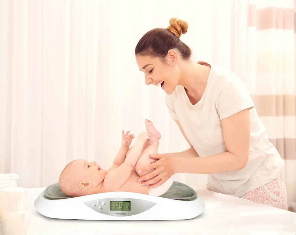 changing pad that weighs baby